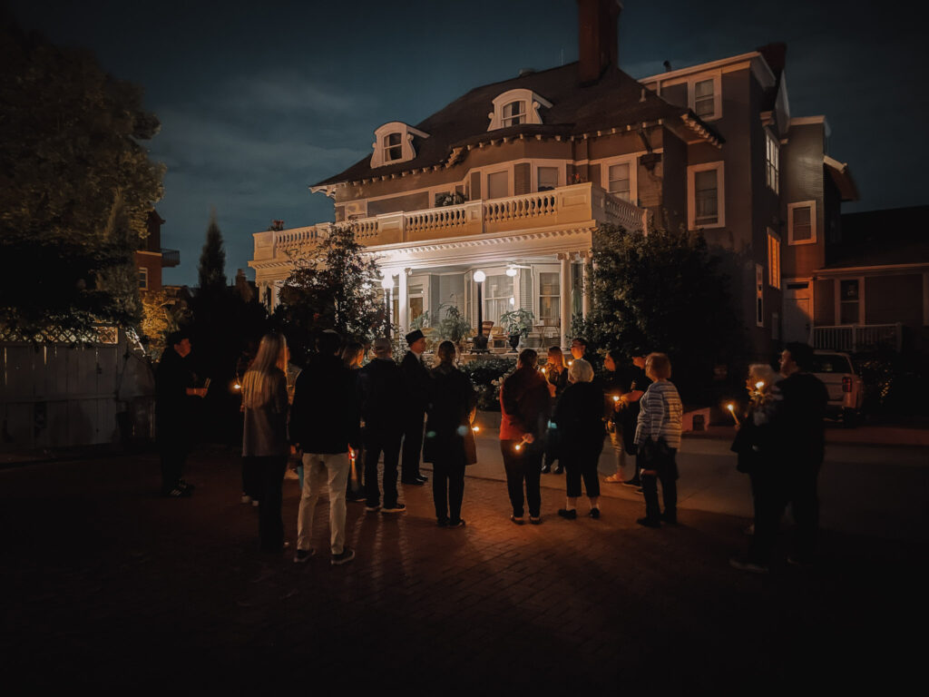 Group tours the mansion after a Haunted Trolley Ride
