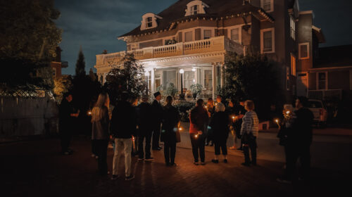 Group tours the mansion after a Haunted Trolley Ride