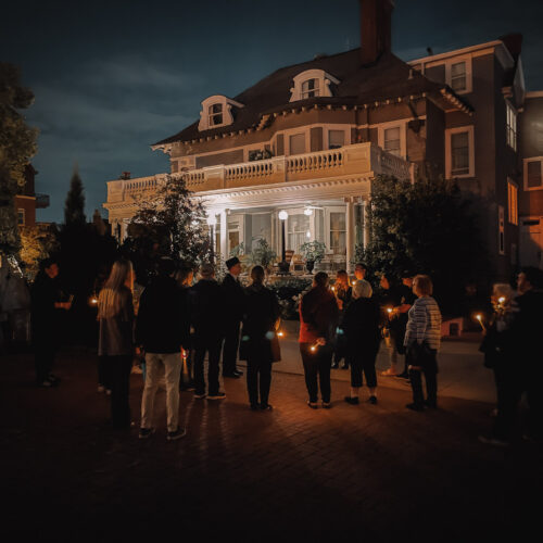 Group tours the mansion after a Haunted Trolley Ride