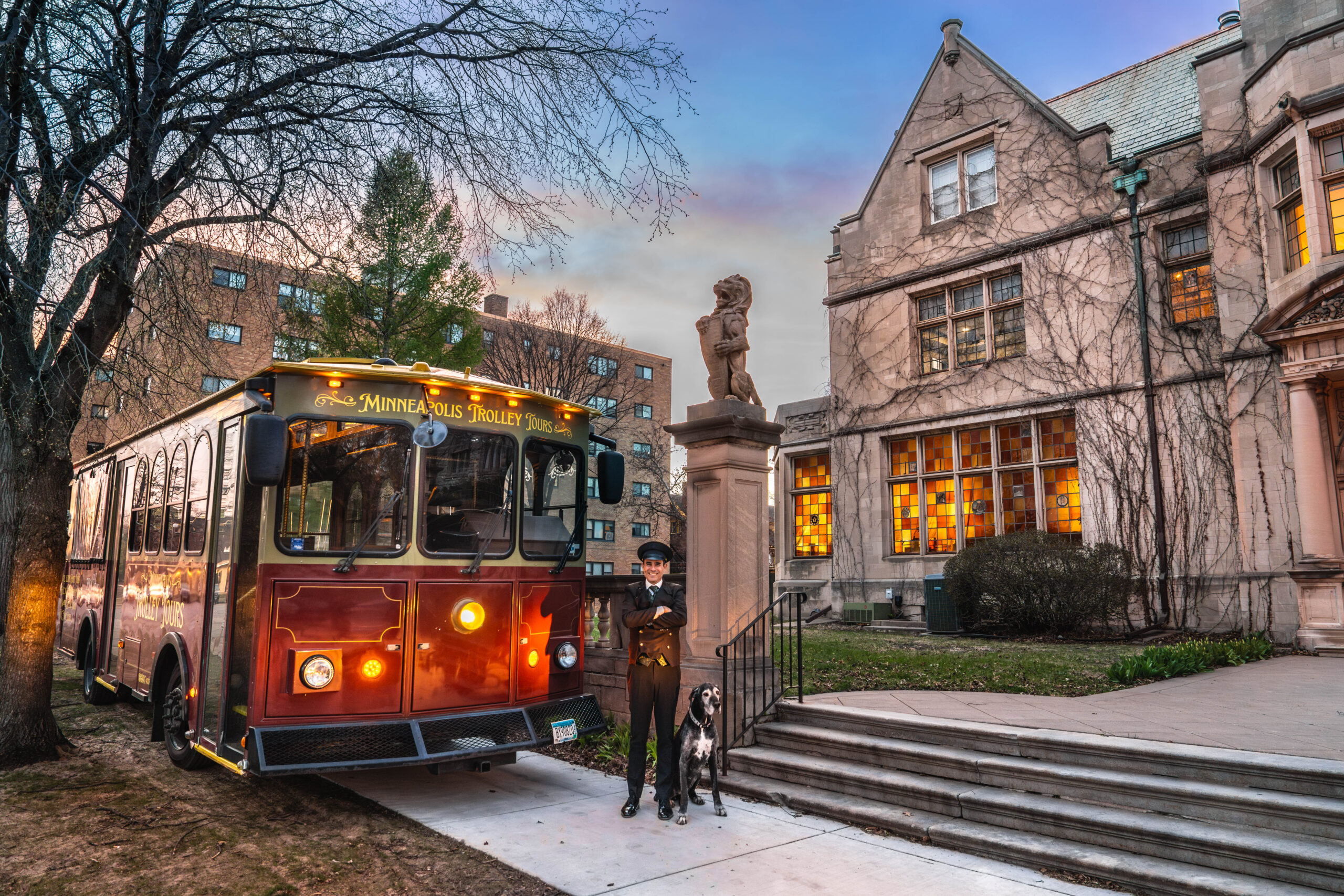 A vintage Minneapolis Trolley Tours car waiting outside the Pillsbury Club mansion, the departure point for city tours over Labor Day weekend.